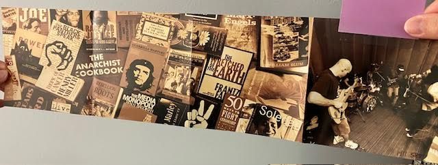 Liner notes for Rage Against the Machine's Evil Empire includes images of many books, including The Anarchist Cookbook, The Wretched of the Earth, and several others in sepia tone. A photograph of the band performing is on the right.