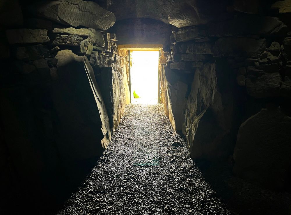 A photo of the small narrow passage, looking from the inside out.