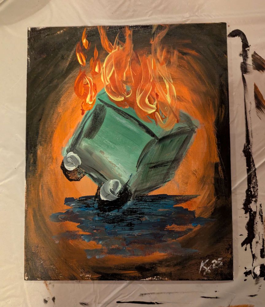 A painting of a green dumpster tipped on one corner with an orange to black faded background. The dumpster is on fire.