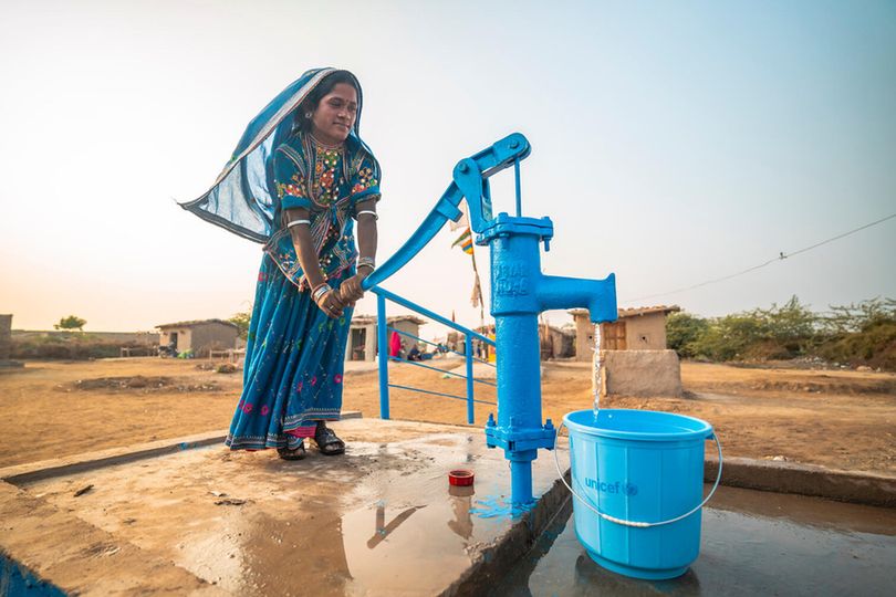 Lali, 18 years old, radiates happiness at the UNICEF-provided water pump in the village of Mir Jan Muhammad, Mirpurkhas, Sindh, Pakistan