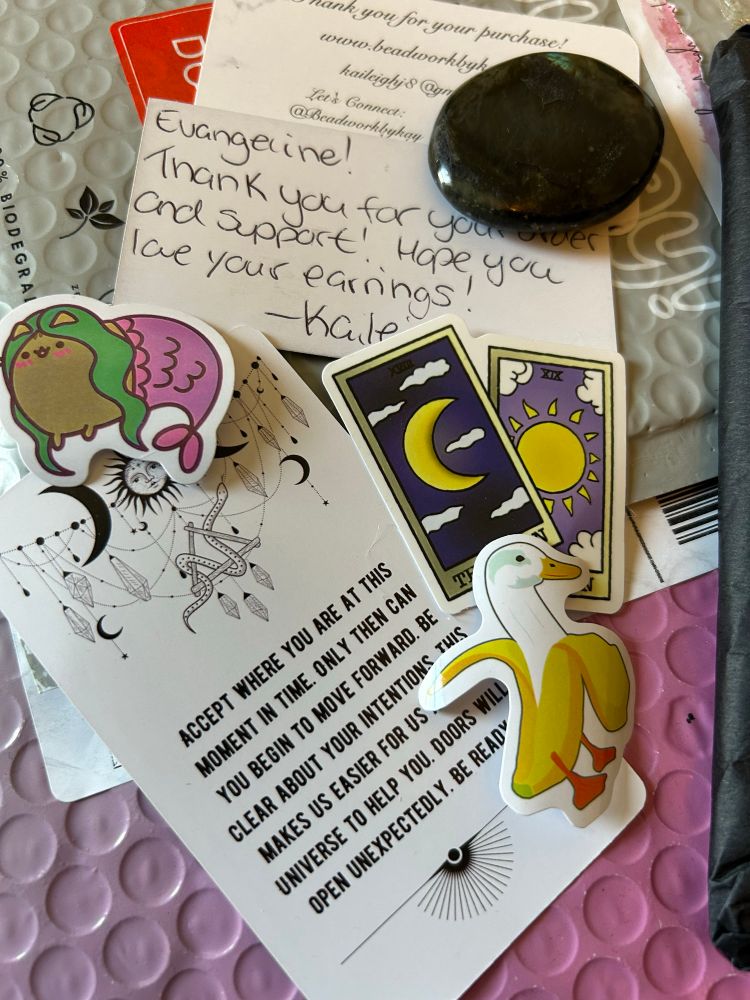 A card with motivational script, several stickers, and a hand-written note from the artists who owns Beadwork by Kay.