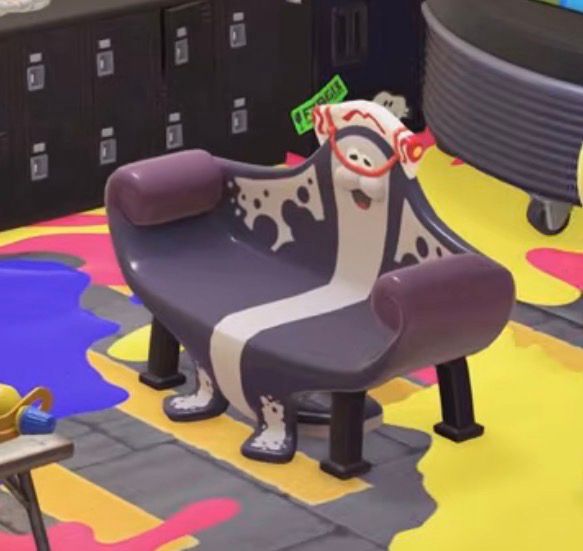 A screenshot of the Animal Crossing 3.0 update that features Big man from Splatoon 3 as a couch 