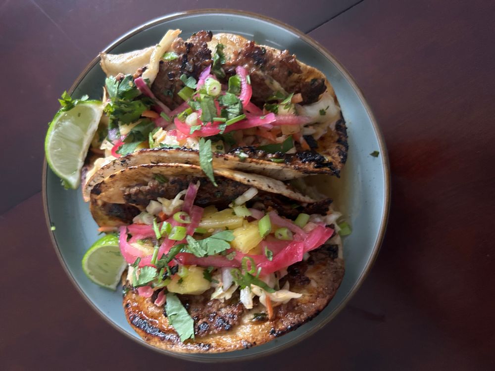 Came down on a plate of tacos that I filled with slaw and pickled cabbage and there’s a fresh lime
