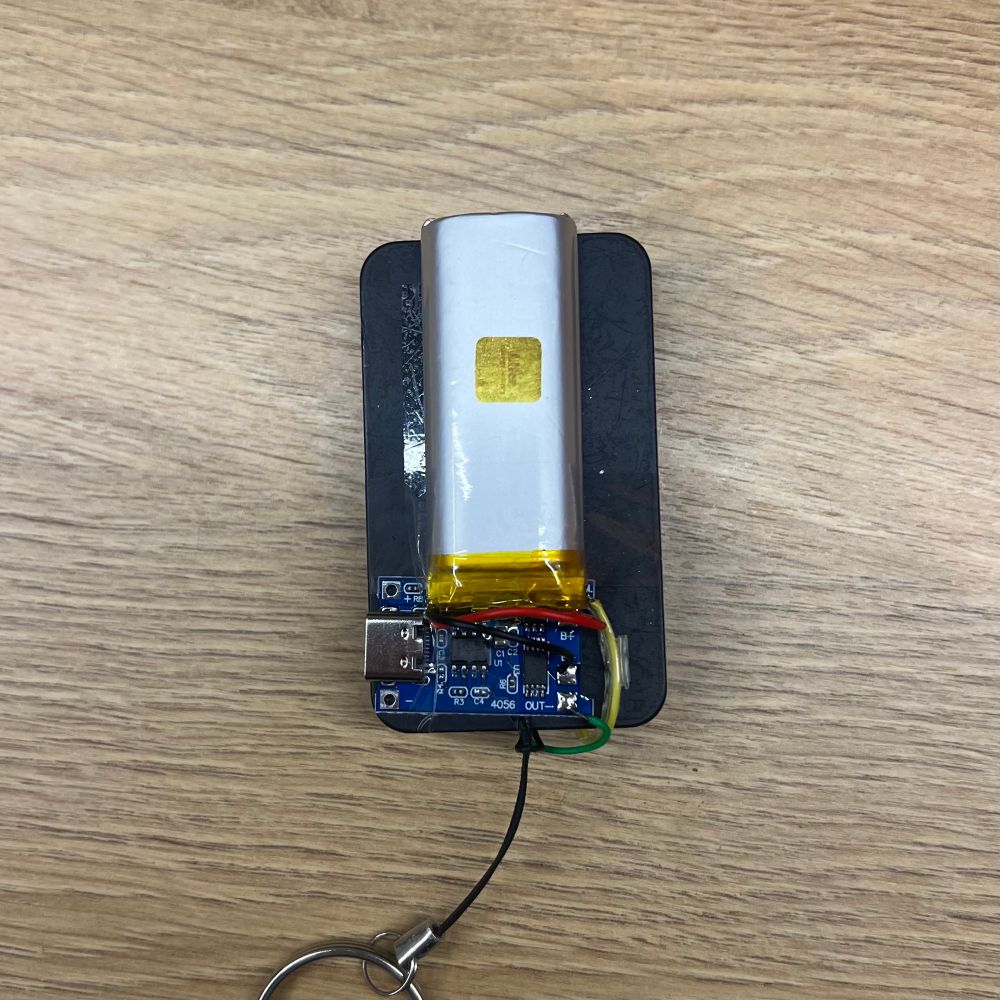 Garage key-fob with Frankensteined lipo cell and charging circuit