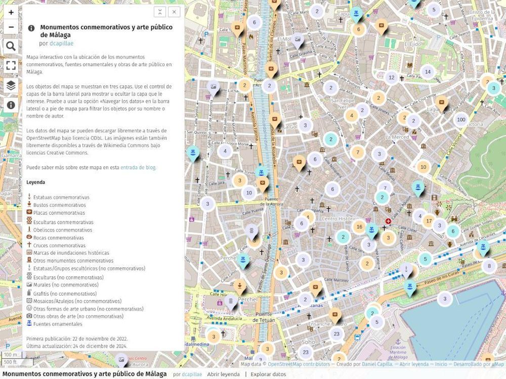 Captura de pantalla del mapa de monumentos conmemorativos y arte público de Málaga en uMap. La imagen muestra un mapa digital de Málaga donde aparecen representadas mediante marcadores e iconos las ubicaciones y tipologías de los monumentos conmemorativos, obras de arte público y fuentes ornamentales de Málaga. A la izquierda de la imagen, una ventana emergente muestra una descripción del contenido y funcionalidades del mapa.