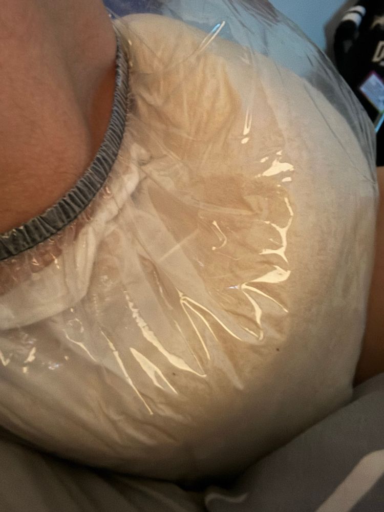 Full, wet and messy diaper, and plastic pants.