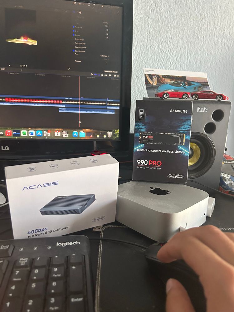 An Acasis SSD enclosure and a 990 Pro Samsung 2TB SSD to help me along editing.
Hercules speakers have a picture of me sitting in a Miami Blue Boxster Spyder at the Porsche Museum, a F355 spider toy car is in front of it and two McLaren F1s right next to it.