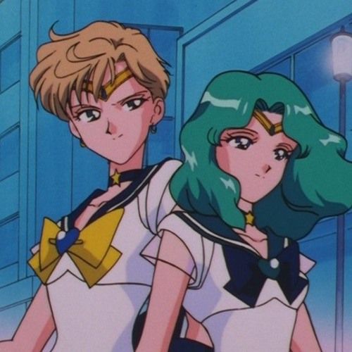 sailor uranus and sailor neptune standing next to each other 