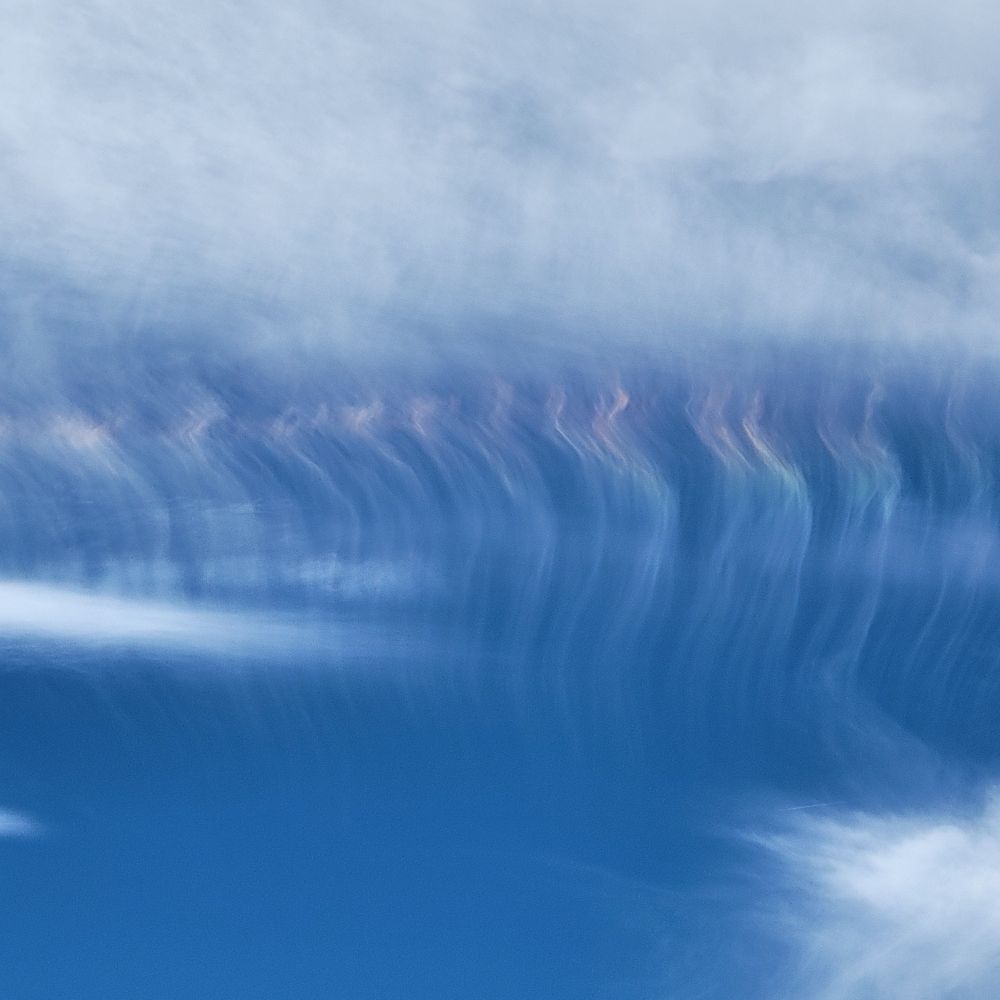 Faint colors in the clouds. Like variegated yarn. 