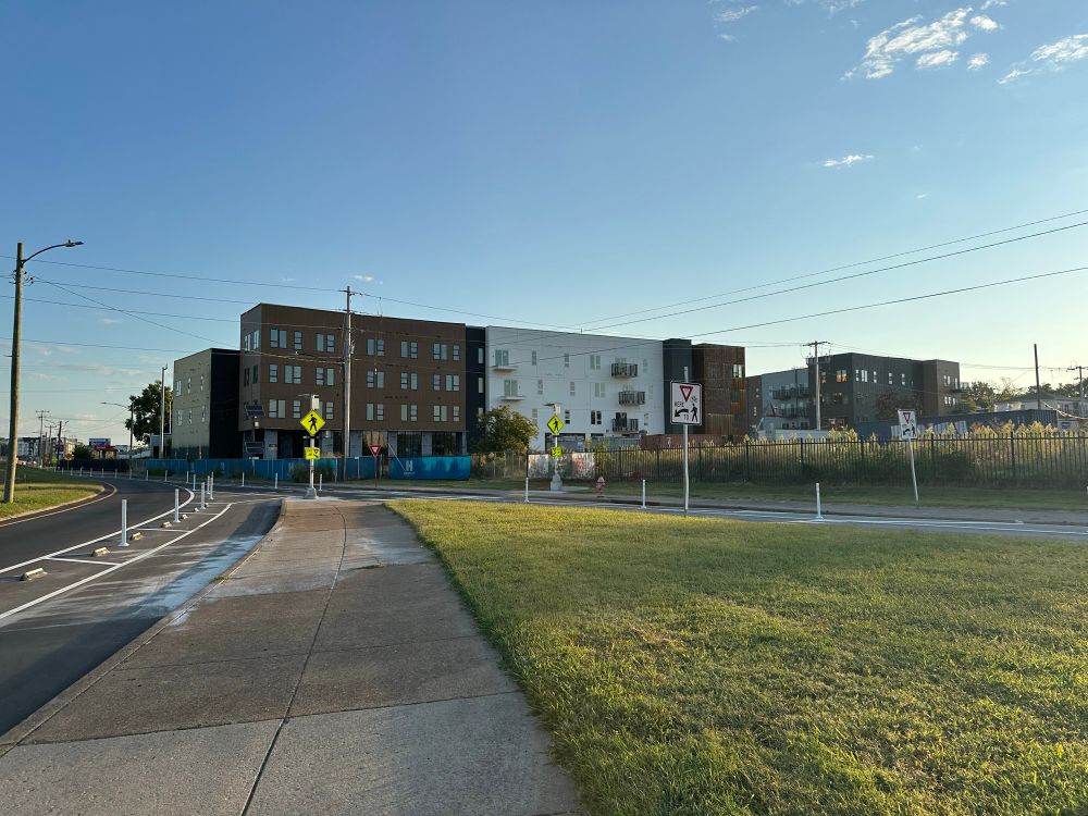 Brand new bike lanes between the sidewalk and Dickerson Pike. Affordable apartments under construction in the background.