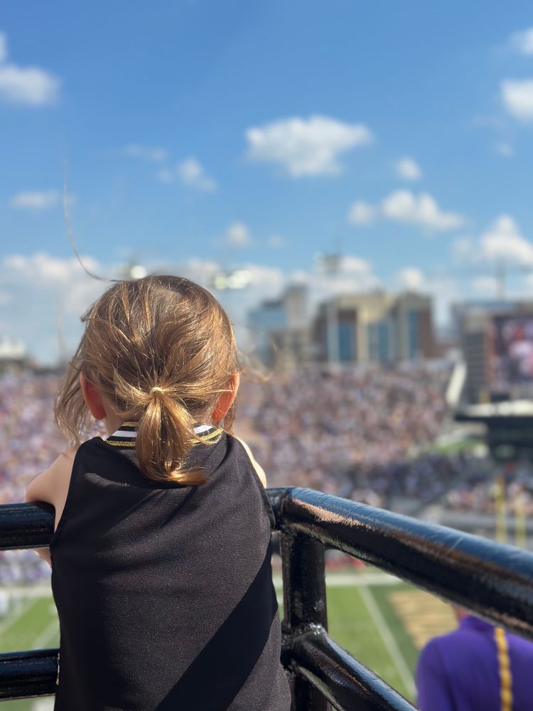 Three year old at the Vanderbilt stadium for football.