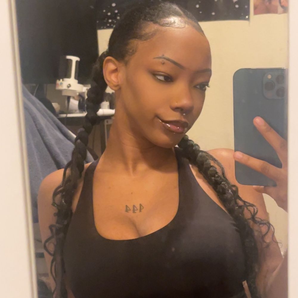 mirror selfie two coquette braids hairstyle 