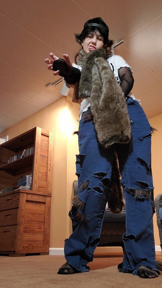 picture of my halloween costume as a frat boy werewolf with a backwards hat and fluffy werewolf ears and tail