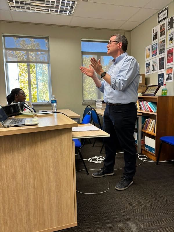 Prof. Daniel Branch speaking in the History Department.