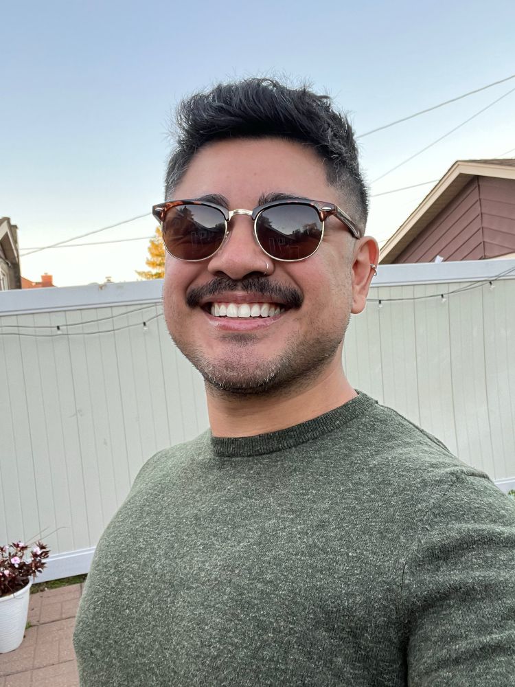 Taking a selfie outside and sharing a smile :)