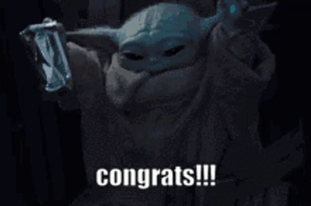 a baby yoda is holding a bag of food and saying congrats !!!