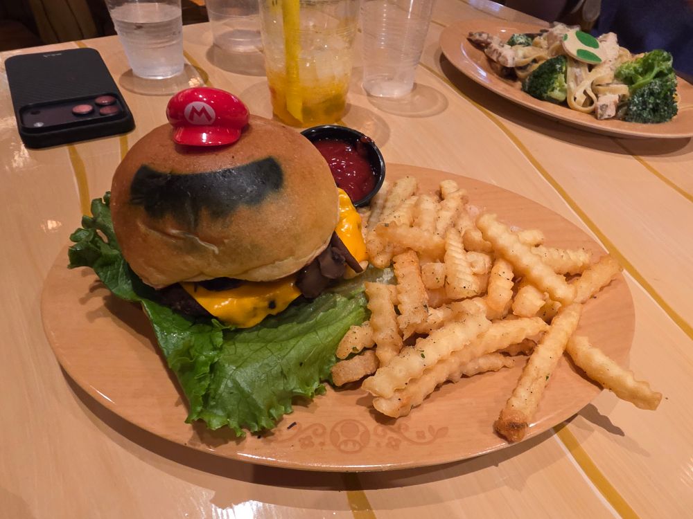 The Mario Burger and Fries. A moustache is seared onto the burger while Mario's hat inhabits it. 