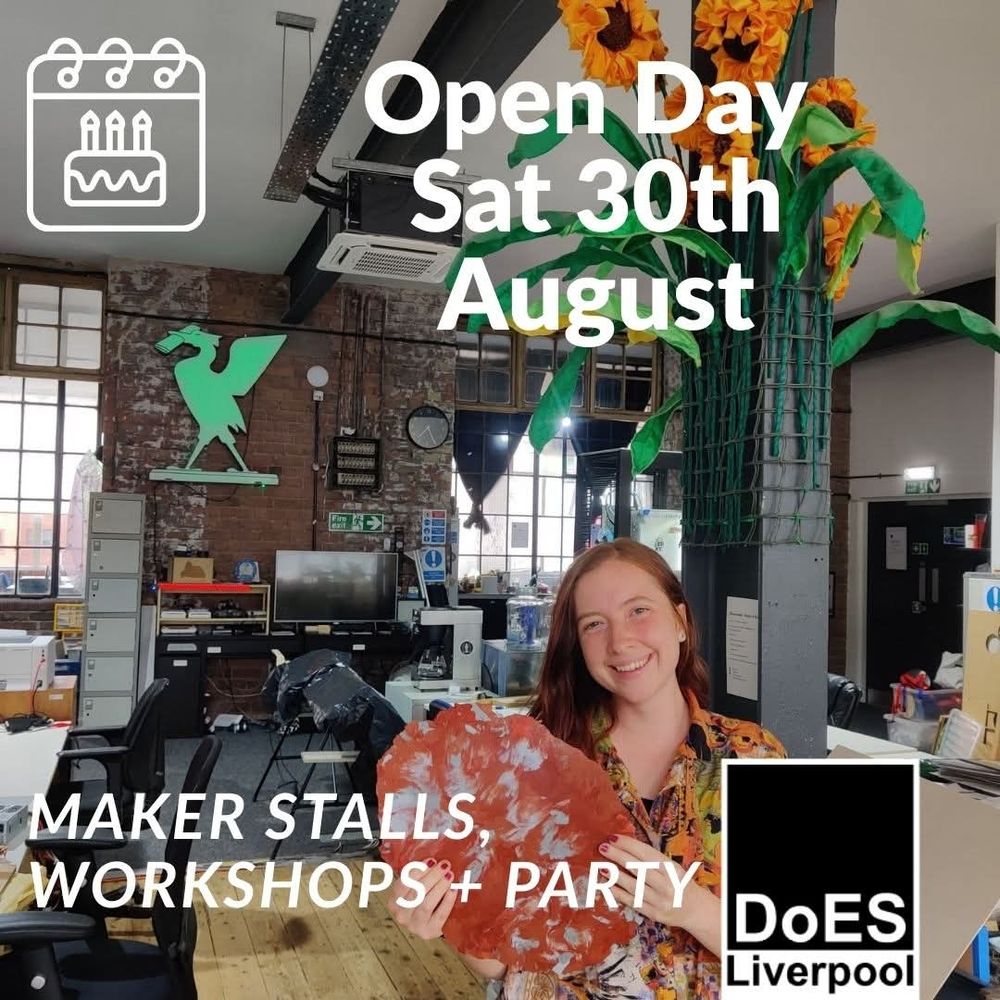 AJ standing in the main space at DoES Liverpool, holding a piece of recycled plastic.
Text "Open Day Sat 30th August" and "Maker Stalls, Workshop and Party".
DoES Liverpool logo.