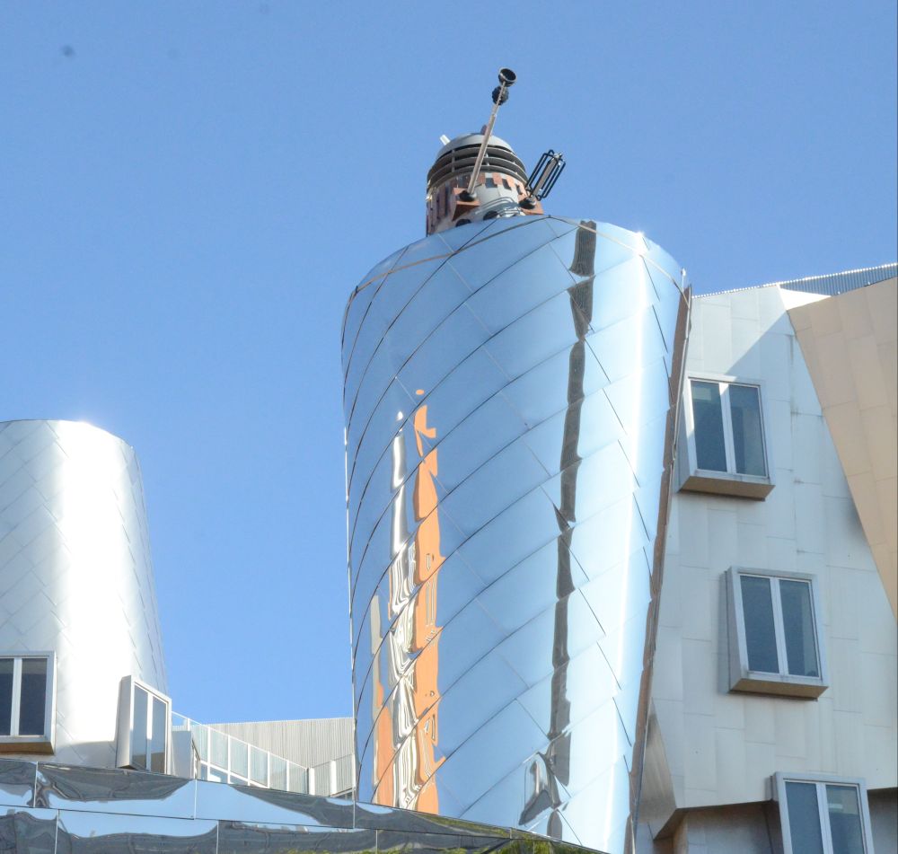 A Dalek perched on top of one of the weird metal tube parts of the Stata Center
