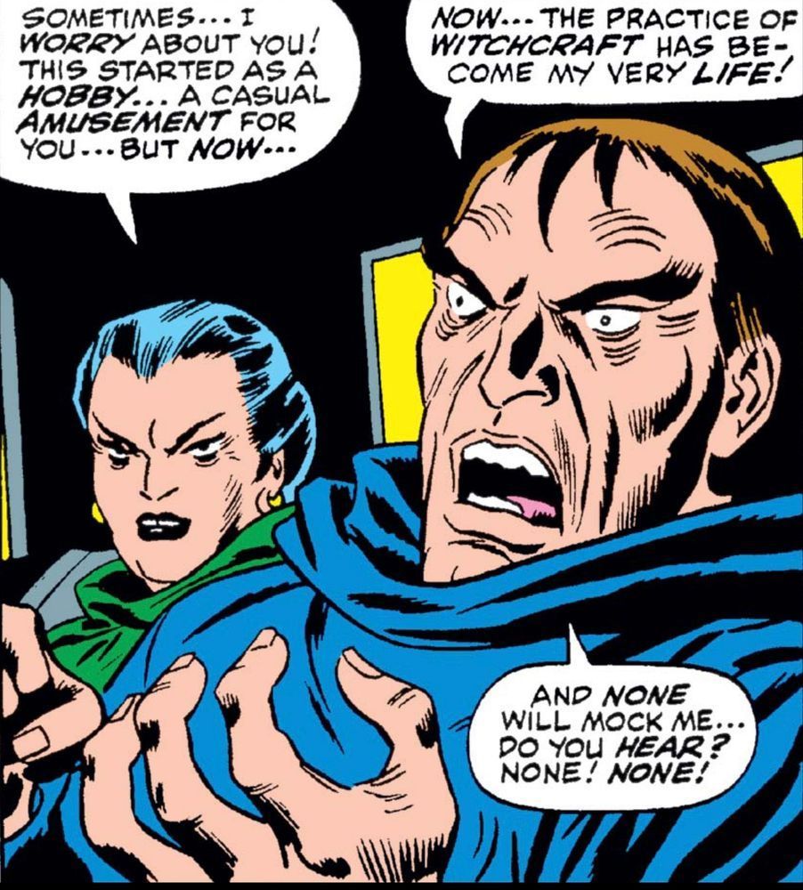 Sitting in the back of a car or a carriage, sets a angry looking woman in a green robe. She says, “Sometimes… I WORRY about you! This started as a HOBBY… A casual AMUSEMENT for you… But NOW….”
The angry man sitting next to her wearing a blue robe replies, “ NOW… The practice of WITCHCRAFT has become my very LIFE! And NONE will mock me… Do you? HERE? None! NONE!“