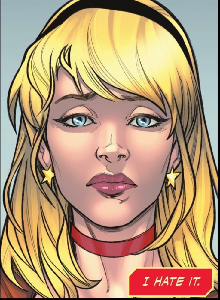 Wonder Girl, Cassie Sandsmark is seen in a head and neck image. She has star-shaped earrings, but her facial expression is anything but bright. She looks sad and despondent as as she faces us and she thinks, “I hate it.“