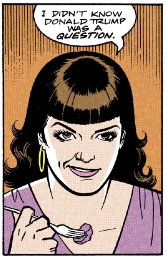 A woman is looking forward just over the shoulder from the reader. She’s wearing a purple dress and she’s holding a fork which has an unidentifiable purple piece of food sustenance on it. Thru a half smirk from the side of her mouth she says, “I didn’t know Donald Trump was a QUESTION.“