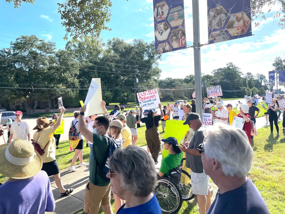 Crowd with protest signs 