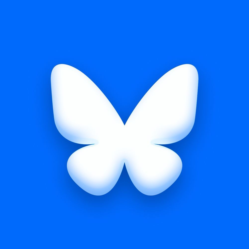 Updated Bluesky logo. A white filled contour of a stylised butterfly with a soft pillow effect hovering over an intense blue background.