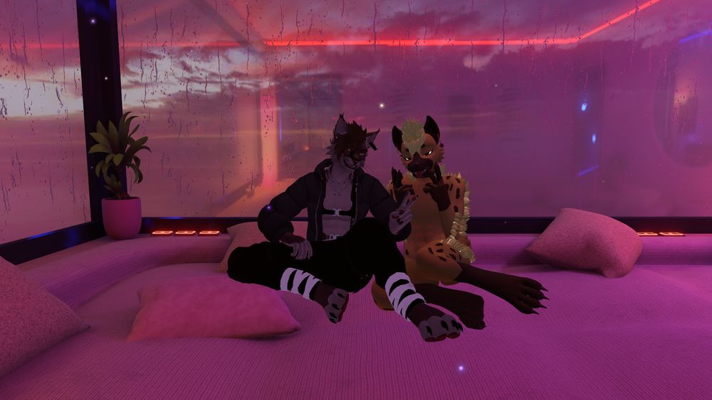 A hyena and cat duo taking a cute picture together. The hyena is emoting peace with two fingers and a flirty grin, whilst the feline has a a comfortable pose and a flirty grin