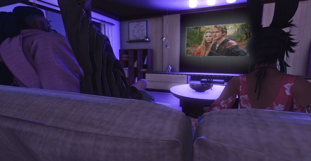 The trio is watching The Princess Bride on their flat screen television, fully locked into the plot.