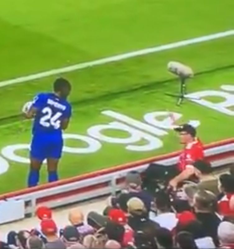 Antoine Semenyo is verbally assaulted by a fan on the touchline.
