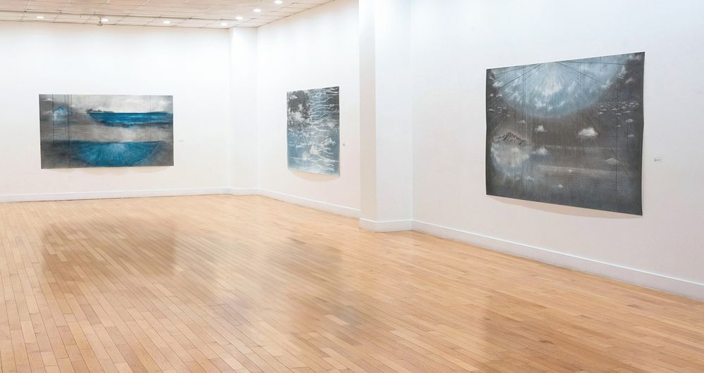  Gallery space with drawings on display