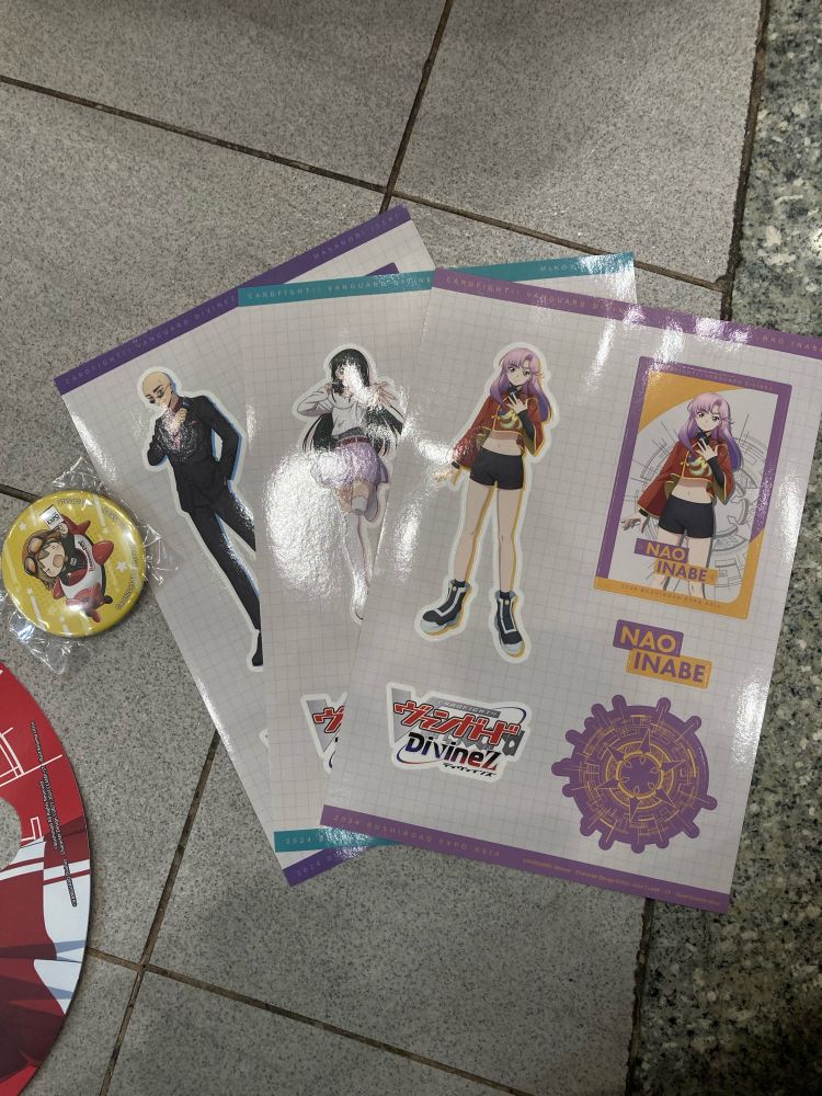 3 Vanguard sticker sheets and a badge