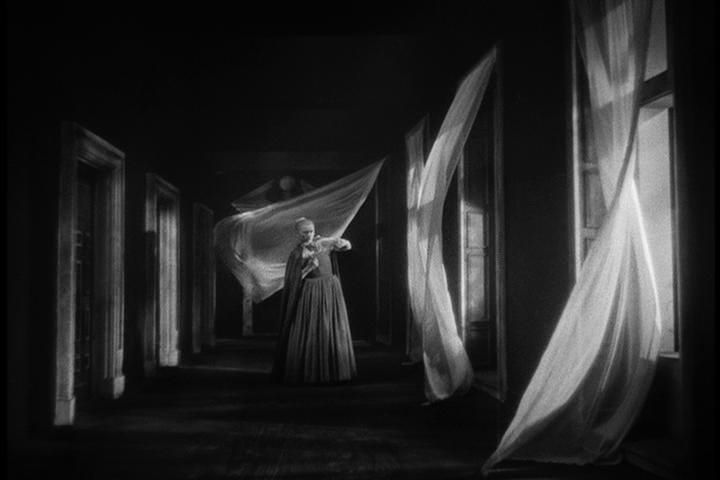 Belle amid drapes