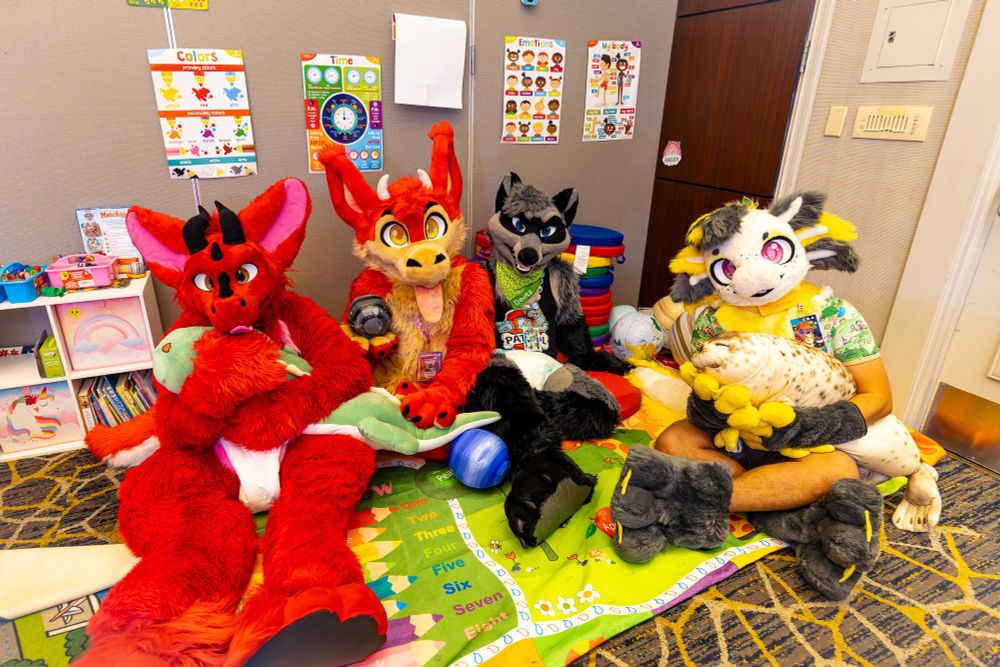 Me (Kaiser), Hellsy, Deetz and Hex sitting down on the school floor holding plushies and the moon