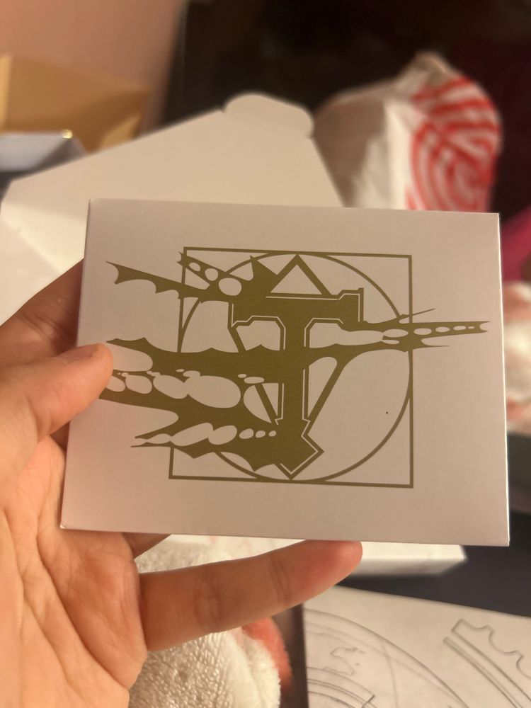 Smaller envelope inside first one with the Talis Hammer insignia