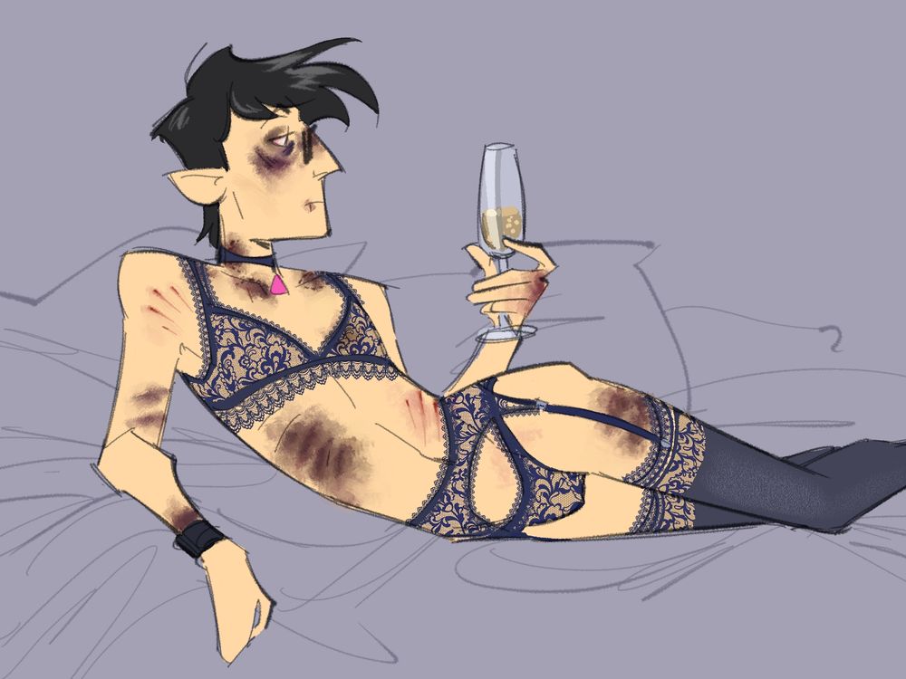 nash laying seductively on his side wearing lacy navy blue lingerie. hes covered in substantial bites and bruises and holding a champagne flute