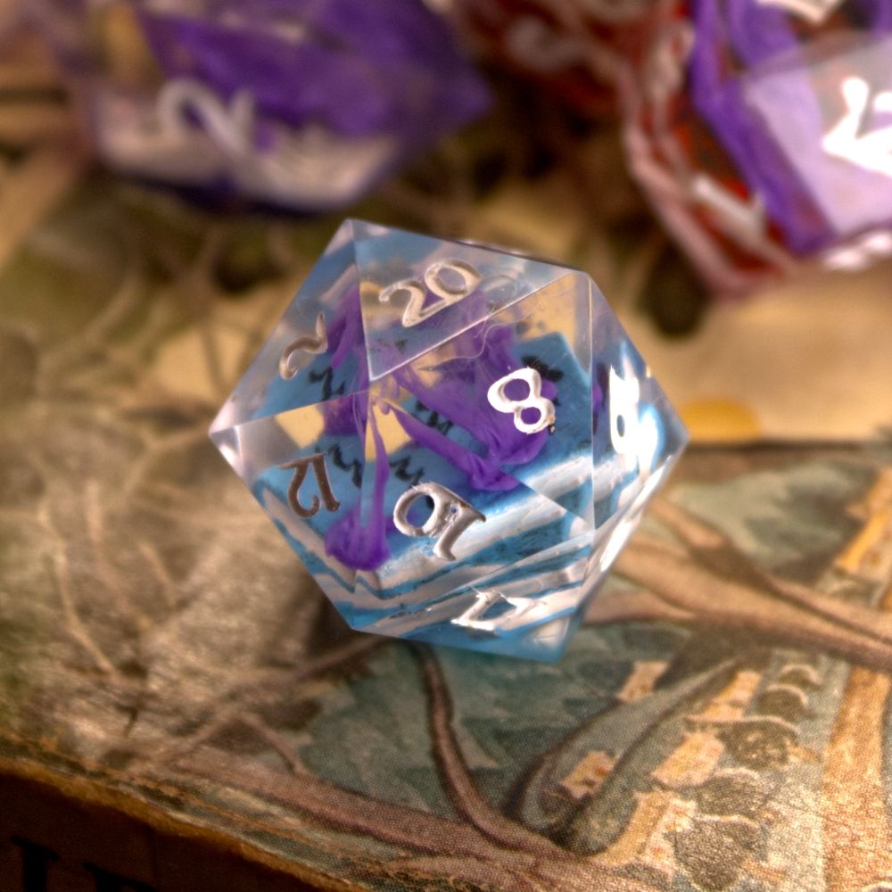 D20 Dice with spellbook inclusion.