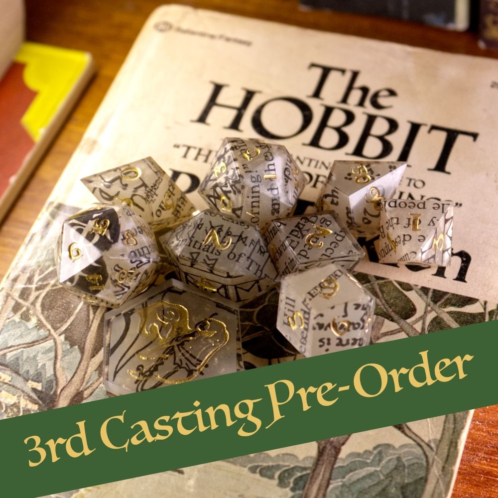 Handmade dice with pages of The Hobbit inside.