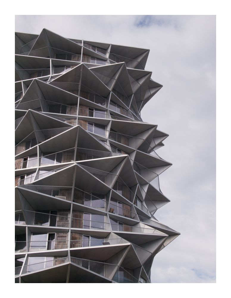 A high-rise-ish building in Copenhagen with many spiky outgrowths.