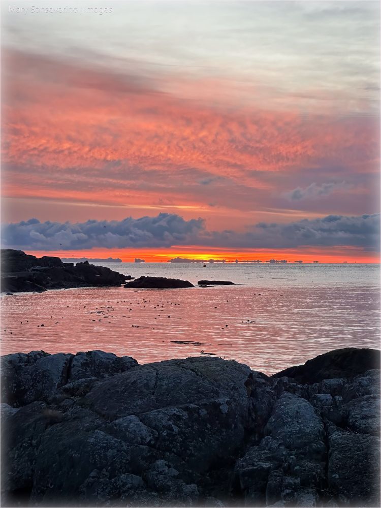 The end of golden hour in the morning. The mountain floating in the sky are in Washington State - Boulder River Wilderness. The highest in the background is Glacier Peak (3214m). 