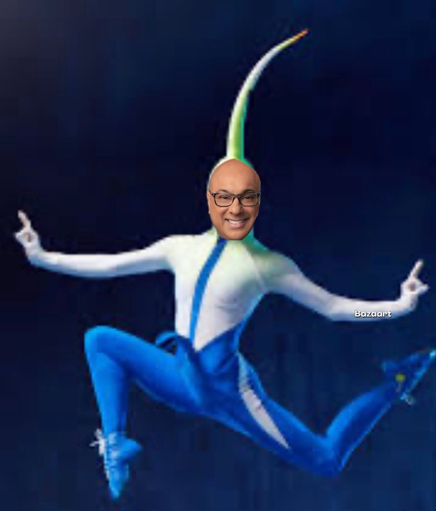 A cirque du Solei performer in blue and silver leotard and tall pointy horn hat w Ali Velshi face superimposed 