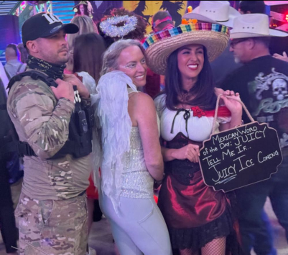 A photo of Lauren Boebert wearing a sombrero carrying a sign that reads “ Mexican word of the day : JUICY Tell me if juicy ICE coming “

Also in the photo is some loser dressed in camouflage with a cap that reads ICE 