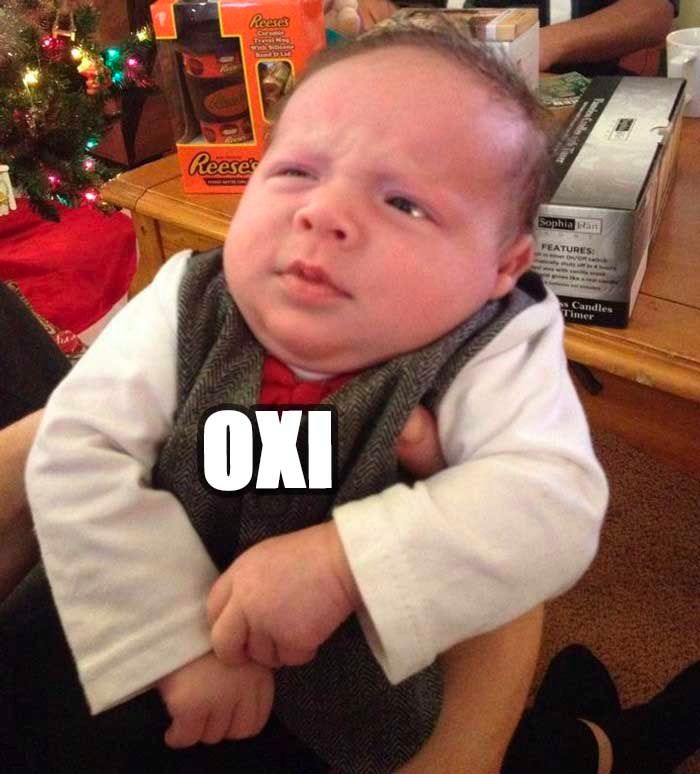 Bebê parece intrigado
Legenda é 
OXI