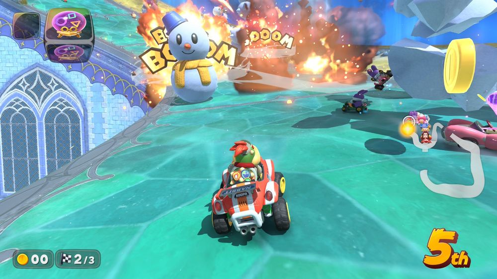 screenshot from Mario Kart World of snowmen and explosions filling the road in front of the player