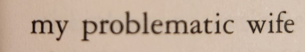 Printed text reading "my problematic wife" 