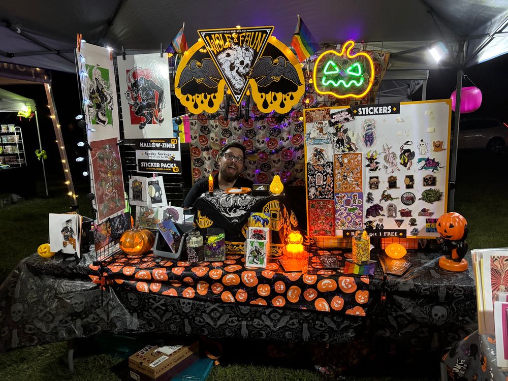 Faun at a table selling art 