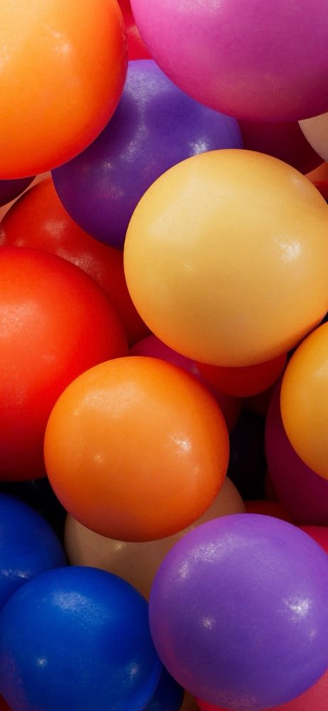 Several colorful spheres overlapping each other