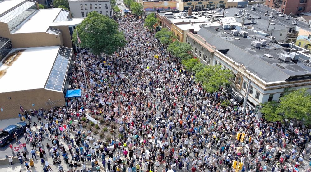 Picture of 7,000 people at the fantastic No Kings Day march and rally in Ann Arbor!  We said to the wanna-be king in DC that we are standing up for our American democracy, and rejecting his dictator-style $45 million birthday parade and the rest of his corrupt regime.  We don't do kings in the USA!