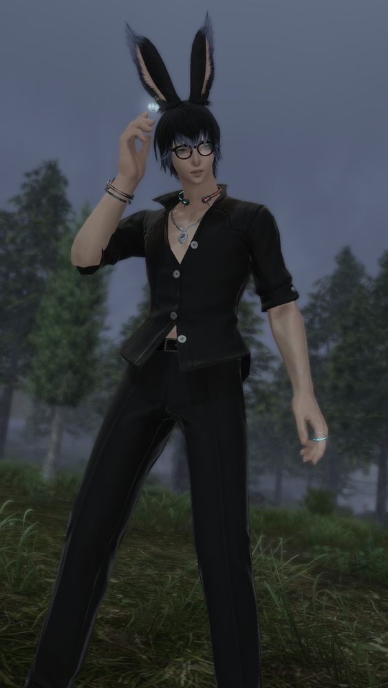 Male viera holding hand to head in worry surrounded by trees with fog